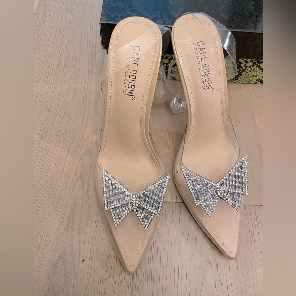 Brand new- in box butterfly clear sling backs heels. Size 9